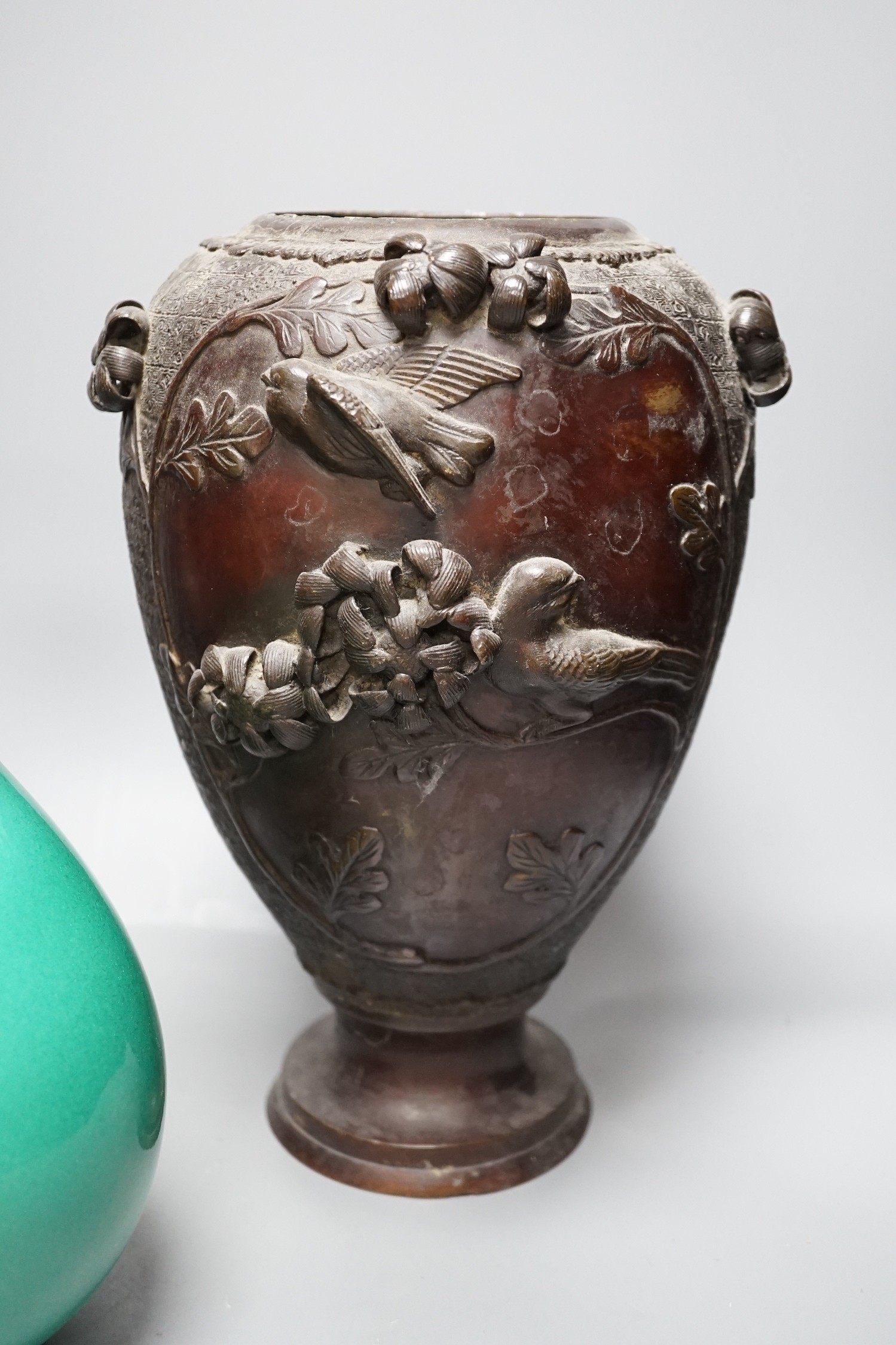 A Chinese green glazed vase with Qianlong seal mark to base and two Japanese bronze vases, tallest 29.5cm